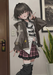  1girl absurdres aegyo_sal badge belt black_hair black_nails brown_jacket button_badge choker collar detached_pants door door_handle earrings fang feet_out_of_frame gishiki_(gshk) hair_between_eyes hair_intakes highres indoors jacket jewelry leather_belt light_switch looking_at_viewer medium_hair midriff_peek multiple_belts multiple_earrings navel necklace open_clothes open_jacket open_mouth original painting_(object) picture_frame pink_skirt plaid_belt plaid_clothes plaid_collar plaid_skirt plant potted_plant shirt skin_fang skirt skull_necklace smiley_face solo spike_piercing spiked_choker spiked_collar spikes standing studded_belt tanaka_kyouko thigh-highs thigh_belt thigh_strap v white_shirt white_thighhighs wolf_cut yellow_eyes 