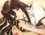  1girl applepie_(12711019) blush brown_hair commentary_request dutch_angle fingernails food food_in_mouth green_eyes highres idolmaster idolmaster_cinderella_girls long_hair looking_at_viewer lying on_bed on_side pillow pocky print_shirt shibuya_rin shirt solo t-shirt white_shirt 