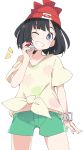  1girl ;) beanie black_hair blue_eyes green_shorts hand_up hat holding holding_poke_ball ixy midriff mizuki_(pokemon) one_eye_closed poke_ball poke_ball_(generic) pokemon pokemon_(game) pokemon_sm red_headwear shirt short_hair short_sleeves shorts simple_background smile solo tied_shirt white_background yellow_shirt 