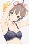  1girl ahoge armpits arms_up bangs bare_shoulders blue_bra blush bra braid breasts brown_hair green_eyes grey_background highres hiroki_(yyqw7151) idolmaster idolmaster_million_live! idolmaster_million_live!_theater_days looking_at_viewer medium_breasts midriff open_mouth sakuramori_kaori shirt short_hair simple_background solo t-shirt tied_hair underwear undressing upper_body 