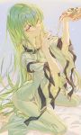 1girl absurdres bangs bed_sheet blush bodysuit breasts c.c. cheese_trail code_geass commentary eating eyebrows_visible_through_hair food green_hair hair_between_eyes highres holding holding_food hong long_hair looking_at_viewer pizza seiza simple_background sitting solo straitjacket very_long_hair wide_sleeves yellow_eyes 