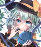  1girl absurdres black_headwear blue_eyes blush bow bunny_(menta1ko) commentary_request crying frilled_sleeves frills green_hair green_nails hand_up hat hat_bow heart heart-shaped_pupils heart_of_string highres komeiji_koishi leaf long_sleeves looking_at_viewer shirt short_hair solo sparkle surreal symbol-shaped_pupils third_eye touhou upper_body watery_eyes white_background yellow_bow yellow_shirt 