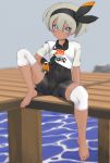  1girl :&lt; aruman barefoot black_bodysuit black_hairband bodysuit bodysuit_under_clothes closed_mouth collared_shirt commentary covered_navel feet gloves grey_eyes grey_hair gym_leader hair_between_eyes hairband holding holding_poke_ball knee_pads looking_at_viewer pier poke_ball pokemon pokemon_(game) pokemon_swsh print_shirt saitou_(pokemon) shirt short_hair short_sleeves sitting solo spread_legs tied_shirt toes ultra_ball water 