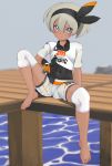  1girl :&lt; aruman barefoot black_bodysuit black_hairband bodysuit bodysuit_under_clothes closed_mouth collared_shirt commentary covered_navel feet gloves grey_eyes grey_hair gym_leader hair_between_eyes hairband holding holding_poke_ball knee_pads looking_at_viewer pier poke_ball pokemon pokemon_(game) pokemon_swsh print_shirt print_shorts saitou_(pokemon) shirt short_hair short_sleeves shorts sitting solo spread_legs tied_shirt toes ultra_ball water 