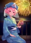  1girl alternate_hairstyle arm_up blue_headwear blue_kimono blush cherry_blossom_print commentary fan fireworks floral_print folding_fan hair_up hand_on_lap hat head_tilt highres holding holding_fan japanese_clothes kanpa_(campagne_9) kimono long_sleeves looking_at_viewer mob_cap night obi outdoors pink_eyes pink_hair railing reflection saigyouji_yuyuko sash sitting solo touhou triangular_headpiece water yukata 