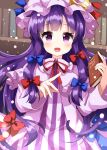  1girl :d bangs blue_bow book bookshelf bow crescent crescent_pin dress eyebrows_visible_through_hair hair_bow hat highres holding holding_book long_hair long_sleeves looking_at_viewer mob_cap multiple_bows open_mouth patchouli_knowledge purple_hair purple_headwear red_bow red_neckwear ruu_(tksymkw) sidelocks smile solo striped striped_dress touhou violet_eyes 