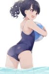  1girl ass ball bangs bare_arms bare_shoulders beachball black_hair blue_swimsuit commentary_request curly_hair eyebrows_visible_through_hair fangs from_behind fukumaru_koito highres hiroki_(yyqw7151) idolmaster idolmaster_shiny_colors object_hug one-piece_swimsuit open_mouth ponytail short_hair skin_fangs solo swimsuit violet_eyes wading water wet white_background 