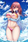  1girl bikini bird blue_eyes blue_jacket blue_sky breasts brown_hair clouds commentary_request cowboy_shot day fou_zi go-toubun_no_hanayome hair_between_eyes headphones headphones_around_neck jacket large_breasts long_hair multicolored multicolored_bikini multicolored_clothes nakano_miku ocean open_clothes open_jacket outdoors seagull side-tie_bikini sky soaking_feet solo standing swimsuit water 