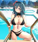  1girl ass_visible_through_thighs bangs bare_arms bare_shoulders bikini black_bikini blue_eyes blue_hair blurry blurry_background breasts byleth_(fire_emblem) byleth_eisner_(female) commentary_request eyebrows_visible_through_hair fire_emblem fire_emblem:_three_houses flower hair_between_eyes hair_flower hair_ornament hibiscus highres large_breasts long_hair looking_at_viewer medium_hair navel outdoors poolside red_flower signature smile solo steeb stomach swimsuit thighs tree water 