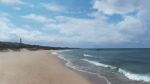  beach bird building clouds cloudy_sky ito_eri lighthouse no_humans original sand scenery sky waves 