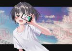  1girl :d blue_sky brown_eyes cellphone fangs grey_hair hair_intakes hand_up heterochromia highres holding holding_phone letterboxed looking_at_viewer nadegata open_mouth original phone pink_eyes shirt short_hair short_sleeves sky smartphone smile solo upper_body white_shirt 