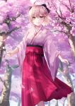  1girl absurdres ahoge bangs black_bow blonde_hair blurry blurry_background bow cherry_blossoms closed_mouth dango day fate_(series) floating_hair flower food hair_between_eyes hair_bow hakama highres holding im_catfood japanese_clothes kimono koha-ace long_sleeves looking_at_viewer okita_souji_(fate) okita_souji_(fate)_(all) outdoors petals pink_flower pink_kimono red_hakama shiny shiny_hair short_hair smile solo spring_(season) standing wagashi wide_sleeves yellow_eyes 