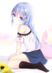  1girl bangs bare_shoulders bed_sheet black_legwear blue_eyes blue_hair blue_skirt blurry blurry_foreground blush closed_mouth commentary_request depth_of_field eyebrows_visible_through_hair flower full_body gochuumon_wa_usagi_desu_ka? hair_between_eyes hair_ornament highres kafuu_chino kouda_suzu long_hair looking_at_viewer looking_to_the_side off-shoulder_shirt off_shoulder puffy_short_sleeves puffy_sleeves red_ribbon ribbon shirt short_sleeves sitting skirt socks solo stuffed_animal stuffed_bunny stuffed_toy sunflower very_long_hair wariza white_shirt x_hair_ornament 