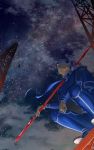  1boy armor blue_hair bodysuit coat cu_chulainn_(fate)_(all) earrings fate/grand_order fate/stay_night fate_(series) from_below full_body gae_bolg genkiniikitaisu highres jewelry lancer long_sleeves looking_up male_focus polearm ponytail red_coat scenery sky solo spear star_(sky) starry_sky weapon wind wind_lift 