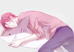  1boy 2y absurdres blue_pants closed_eyes closed_mouth commentary free! grey_background highres male_focus matsuoka_rin pants pink_shirt red_hair shirt short_hair sleeping solo stuffed_animal stuffed_shark stuffed_toy 
