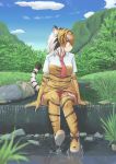  1girl :3 animal_ear_fluff animal_ears animal_print black_hair blue_sky boots clouds commentary day elbow_gloves full_body gloves grass hane_(kirschbaum) highres kemono_friends looking_to_the_side multicolored_hair nature necktie orange_hair outdoors print_gloves print_legwear red_neckwear river rock short_sleeves sky solo sumatran_tiger_(kemono_friends) tail thigh-highs tiger_ears tiger_girl tiger_print tiger_tail water waterfall white_hair yellow_eyes 