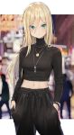  1girl bangs black_pants black_sweater blonde_hair blurry blurry_background blush bokeh breasts closed_mouth cowboy_shot crop_top depth_of_field green_eyes hair_between_eyes hands_in_pockets highres isegawa_yasutaka jewelry long_hair long_sleeves looking_at_viewer medium_breasts midriff navel necklace original pants raised_eyebrow solo sweater taut_clothes taut_sweater track_pants turtleneck turtleneck_sweater 