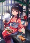  1girl brown_eyes brown_hair candy_apple chopsticks cotton_candy eating fireworks floral_print food hair_ornament hair_scrunchie highres japanese_clothes kimono looking_at_viewer original ponytail red_kimono red_scrunchie scrunchie sidelocks sitting solo summer_festival takoyaki uni_sirasu veranda wide_sleeves yukata 