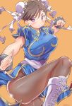  1girl bouncing_breasts breasts brown_hair chinese_clothes chun-li fighting_stance highres iwasaki_masakazu leggings orange_background solo street_fighter thighs v-shaped_eyebrows violet_eyes 