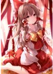  1girl absurdres autumn_leaves bangs barefoot between_legs blurry blurry_background blush bow bowtie brown_eyes brown_hair collarbone detached_sleeves eyebrows_visible_through_hair fingernails frilled_bow frilled_shirt_collar frills hair_bow hair_tubes hakurei_reimu highres holding long_hair looking_at_viewer mochizuki_shiina parted_lips red_bow red_ribbon red_shirt red_skirt ribbon scan shiny shiny_hair shirt simple_background sitting skirt solo tied_hair touhou wariza wide_sleeves yellow_bow yellow_neckwear 
