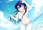  1girl bangs bikini blue_hair blush cowboy_shot day hand_up highres holding holding_water_gun long_hair looking_at_viewer love_live! love_live!_school_idol_project marine_day misoradeko ocean one_eye_closed open_mouth see-through side-tie_bikini smile solo sonoda_umi striped striped_bikini swimsuit water water_gun yellow_eyes 