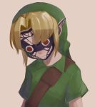  1boy arms_at_sides bangs blonde_hair border brown_background closed_mouth commentary_request facepaint facing_viewer green_headwear green_shirt hat highres link male_focus mazel parted_bangs pointy_ears red_eyes shirt short_hair short_sleeves simple_background solo the_legend_of_zelda the_legend_of_zelda:_majora&#039;s_mask upper_body white_border 