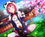  1girl absurdres animal_costume bangs black_legwear boots bridge cherry_blossoms chinese_clothes clouds cloudy_sky detached_sleeves earrings floral_print flower grass green_eyes hair_ornament highres indian_style jewelry kurosawa_ruby lace lace-trimmed_skirt long_sleeves looking_at_viewer love_live! love_live!_sunshine!! one_eye_closed pagoda panda_costume panda_hood pink_ribbon pink_skirt redhead ribbon shirt short_hair sitting skirt sky sleeves_past_fingers sleeves_past_wrists smile solo stuffed_animal stuffed_panda stuffed_toy tsumikiy vest white_shirt 