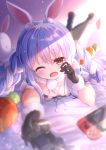  1girl animal_ears bangs bare_shoulders bed_sheet black_gloves black_legwear black_leotard blue_hair blurry blurry_background blurry_foreground blush braid commentary_request controller depth_of_field don-chan_(usada_pekora) eyebrows_visible_through_hair fukemachi fur-trimmed_gloves fur_trim game_controller gloves hair_between_eyes hand_up highres holding hololive legs_up leotard long_hair lying multicolored_hair nintendo_switch on_stomach open_mouth rabbit_ears red_eyes short_eyebrows standing strapless strapless_leotard stuffed_animal stuffed_bunny stuffed_toy thick_eyebrows twin_braids twintails two-tone_hair usada_pekora very_long_hair virtual_youtuber wavy_mouth white_hair 