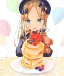 1girl abigail_williams_(fate/grand_order) balloon bangs birthday black_bow black_dress black_headwear blonde_hair blue_eyes blueberry bow dress eyebrows_visible_through_hair fate/grand_order fate_(series) food forehead fruit hair_bow hat highres indoors long_hair multiple_bows multiple_hair_bows object_hug open_mouth orange_bow pancake parted_bangs plate polka_dot polka_dot_bow purple_bow sakazakinchan simple_background sleeves_past_fingers sleeves_past_wrists smile solo stack_of_pancakes strawberry stuffed_animal stuffed_toy table teddy_bear white_background 