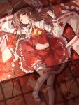  1girl absurdres bow commentary_request detached_sleeves gohei hair_bow hair_tubes hakurei_reimu highres kerno lying midriff navel on_back one_eye_closed red_bow red_skirt skirt smile solo touhou wide_sleeves 
