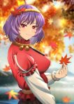  1girl arm_up autumn_leaves blue_sky blurry blurry_background blurry_foreground breasts brown_skirt commentary_request day from_side ginkgo_leaf hair_ornament highres holding holding_leaf large_breasts layered_sleeves leaf leaf_hair_ornament long_sleeves looking_at_viewer maple_leaf murasaki_tsutsuji outdoors puffy_short_sleeves puffy_sleeves purple_hair red_eyes red_shirt rope_belt shirt short_hair short_sleeves skirt sky smile solo standing touhou tree upper_body white_sleeves yasaka_kanako 