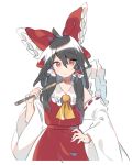  1girl ahoge akagashi_hagane black_hair bow commentary cowboy_shot detached_sleeves frilled_bow frills gohei hair_bow hair_tubes hakurei_reimu hand_on_hip holding long_hair long_sleeves looking_at_viewer over_shoulder red_bow red_eyes red_shirt red_skirt shirt simple_background skirt solo touhou white_background wide_sleeves yellow_neckwear 