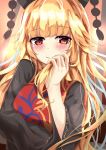  1girl bangs black_dress black_headwear blonde_hair blush breasts closed_mouth commentary_request dress eyebrows_visible_through_hair hand_in_hair hand_to_own_mouth hat junko_(touhou) kerotsupii_deisuku large_breasts long_hair long_sleeves looking_at_viewer pom_pom_(clothes) red_eyes sidelocks smile solo tabard tassel touhou upper_body wide_sleeves 