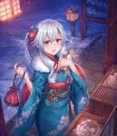  1girl :d absurdres ahoge blue_kimono blush brown_sash floral_print fur-trimmed_kimono fur_trim grey_hair hand_up highres holding japanese_clothes kimono kinchaku lantern long_hair long_sleeves looking_at_viewer night obi open_mouth original outdoors pouch print_kimono red_eyes sash shichigatsu side_ponytail smile snow solo white_hair wide_sleeves 