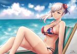  1girl american_flag_bikini asymmetrical_hair bangs beach_chair bikini blue_eyes breasts bun_cover fate/grand_order fate_(series) flag_print front-tie_bikini front-tie_top grey_hair hair_bun highres large_breasts long_hair miyamoto_musashi_(fate/grand_order) miyamoto_musashi_(swimsuit_berserker)_(fate) multi-strapped_bikini navel print_swimsuit side_bun single_hair_intake single_sidelock solo swept_bangs swimsuit tan tanline zin_(pixiv30275228) 