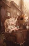  1girl ari_(shichigatsu) armchair blouse book bookshelf braid brown_eyes brown_skirt cabinet chair closed_mouth grey_hair highres holding indoors long_skirt original painting_(object) parted_lips phonograph plant pot potted_plant shichigatsu sitting skirt solo twin_braids twintails white_blouse 