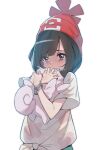  black_hair clefairy crying crying_with_eyes_open floral_print gen_1_pokemon highres object_hug poke_ball_print pokemon pokemon_(game) pokemon_sm red_headwear selene_(pokemon) short_hair supernew tears 