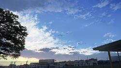  anyotete building cityscape clouds commentary fence highres no_humans original outdoors scenery sky sunset tree twilight 