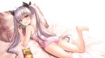  1girl :d ass bag_of_chips bangs bare_arms bare_legs bare_shoulders barefoot bed_sheet blush bnari camisole commentary_request eyebrows_visible_through_hair fang hair_between_eyes highres holding horns korean_text leg_up long_hair lying nintendo_switch on_stomach open_mouth original pillow pink_camisole pink_shorts red_eyes short_shorts shorts silver_hair smile solo translation_request twintails very_long_hair white_background 
