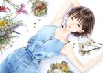  1girl :o arm_behind_head armpits blue_dress brown_eyes brown_hair buttons cowboy_shot dress earrings flower fukada_eimi jewelry kishida_mel looking_at_viewer lying real_life short_hair smile solo white_background 