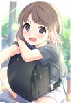  1girl :d absurdres backpack bag black_bag blurry bokeh border brown_hair crime_prevention_buzzer depth_of_field grey_shirt grey_shorts highres looking_at_viewer open_mouth original randoseru sekina shirt short_sleeves shorts sitting smile solo white_border 