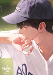  1boy art_study baseball_cap baseball_jersey black_hair brown_eyes commentary english_commentary fingernails hat highres jaeun_38 jersey male_focus mole mole_under_eye original shirt short_hair solo sweat upper_body white_shirt wiping_sweat 