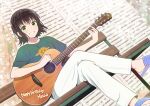  1girl black_hair enogu green_eyes green_shirt guitar highres hinata_nao_(iwamotochou_geinousha) instrument iwamotochou_geinousha looking_at_viewer outdoors pants shirt shiwasu_takashi short_hair short_sleeves sitting solo teeth virtual_youtuber white_pants 