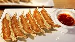  artist_name blurry blurry_background dumpling food highres indoors jiaozi no_humans original p-pigling plate sauce 