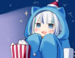  1girl :&gt; animal_hood blue_background blue_eyes blue_hoodie blush commentary cup eating eyebrows_visible_through_hair food gawr_gura happy hat hololive hololive_english hood hoodie karory light long_sleeves mini_hat mug multicolored_hair open_mouth oversized_clothes popcorn santa_hat simple_background solo sparkle streaked_hair upper_body white_hair 