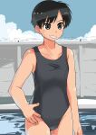  1girl absurdres bangs black_eyes black_hair black_swimsuit blue_sky clouds cloudy_sky commentary cowboy_shot day grin haida_katsuretsu hand_on_hip highres looking_to_the_side one-piece_swimsuit original outdoors school_swimsuit short_hair sky smile solo standing swimsuit tomboy 
