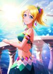  1girl absurdres alternate_costume ayase_eli blonde_hair blue_eyes blush earrings enoa flower from_side hair_flower hair_ornament highres jewelry looking_at_viewer love_live! love_live!_school_idol_project ocean ponytail railing smile solo water 
