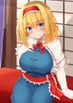  1girl :o alice_margatroid arm_support bangs blonde_hair blue_dress blue_eyes blush bow bowtie breasts capelet commentary_request cowboy_shot dress elbow_gloves gloves hair_between_eyes hairband head_tilt highres large_breasts looking_at_viewer medium_hair parted_lips red_bow red_hairband red_neckwear red_sash sash sitting solo tksand touhou wall white_capelet white_gloves window 