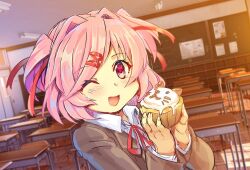  1girl animal-themed_food blazer blush classroom collared_shirt commentary_request cupcake desk doki_doki_literature_club doki_doki_literature_club_school_uniform dutch_angle eyelashes fang fingernails food grey_jacket hair_intakes hair_ornament hair_ribbon holding holding_food indoors jacket light_particles long_sleeves natsuki_(doki_doki_literature_club) neck_ribbon one_eye_closed open_mouth pink_eyes pink_hair red_ribbon ribbon school_desk school_uniform shirt short_hair skin_fang smile solo tsrfo two_side_up white_shirt 
