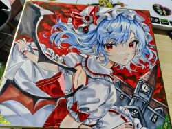  1girl absurdres back_bow back_cutout bat_wings blue_hair bow building clothing_cutout collared_shirt commentary_request frilled_shirt_collar frills hat hat_bow highres l0e9s29p long_hair looking_at_viewer mob_cap photo_(medium) red_bow red_eyes red_sky remilia_scarlet ribbon-trimmed_skirt ribbon_trim scarlet_devil_mansion shirt skirt skirt_set sky solo touhou traditional_media white_hat white_shirt white_skirt wings wrist_cuffs 